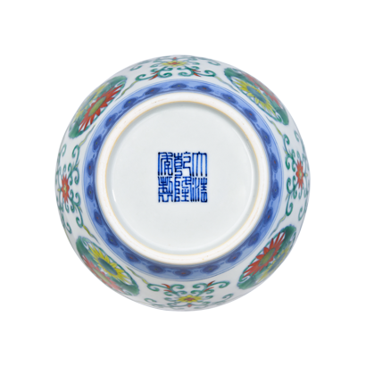 Lot 65: Doucai Covered Jar with Chrysanthemum Medallion Design 斗彩团菊纹盖罐